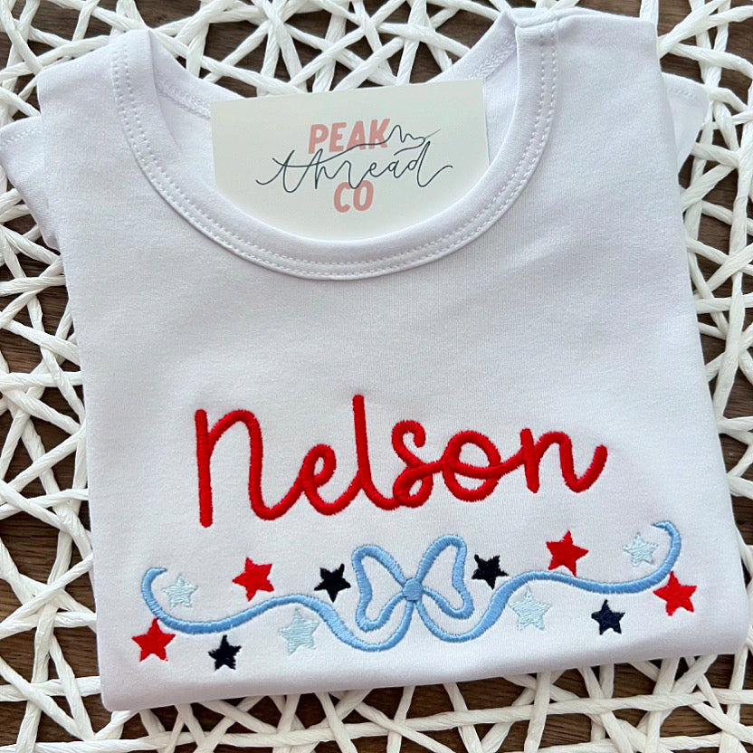 Patriotic Bow Swash Ruffle Tee