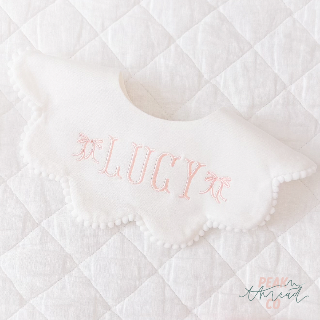 Scalloped Pom Pom Bib