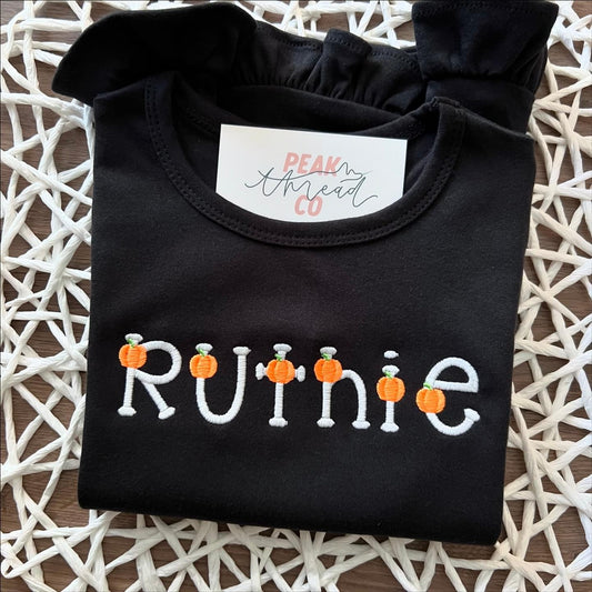 Spooky Pumpkin Letter Ruffle Tee